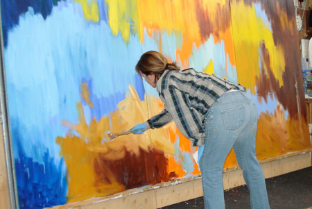 Gerda beginning painting on large scale canvas